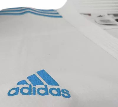 KARATEGI ADIDAS ADILIGHT PRIMEGREEN CON STRISCE BLU WKF - KARATE